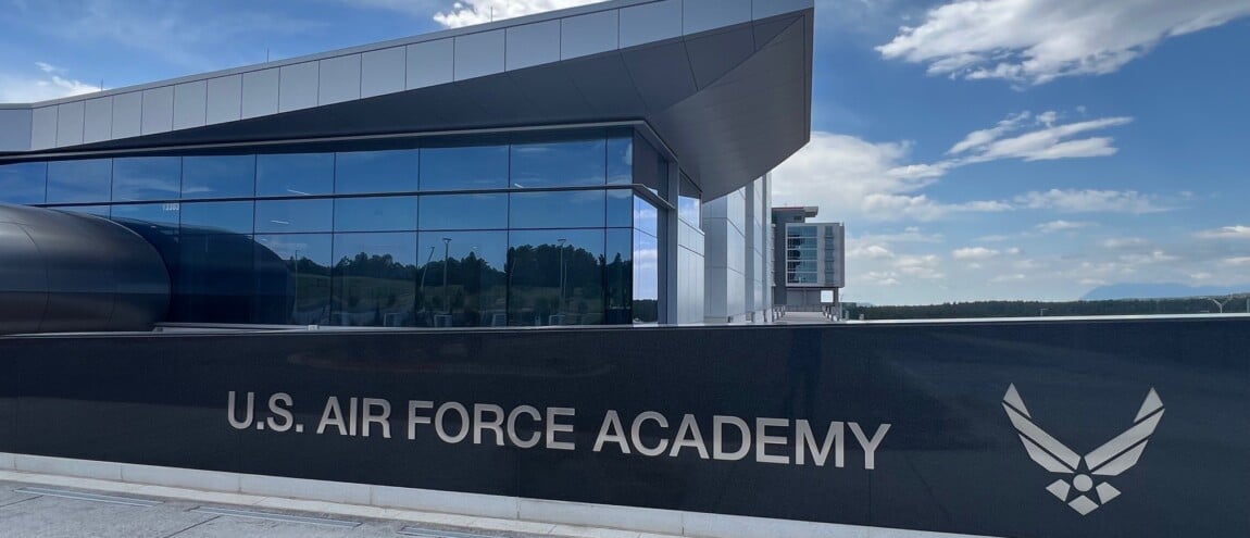 U.S. Air Force Academy building with logo.