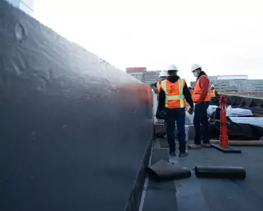 Construction workers doing Waterproofing Coatings