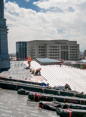 Construction workers doing Preventative Commercial Roof Maintenance