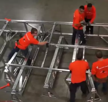 Workers Building Framecad Materials