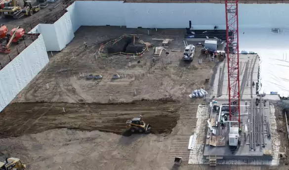 Construction Workers laying Below Grade Waterproofing