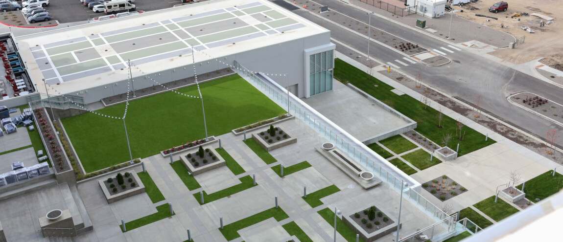 Aerial view of a modern building and parking area