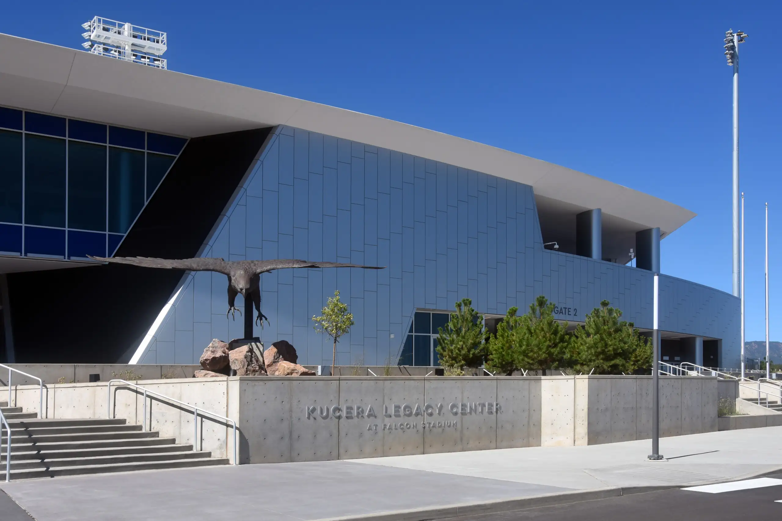 Kucera Legacy Center at Falcon Stadium entrance with eagle statue