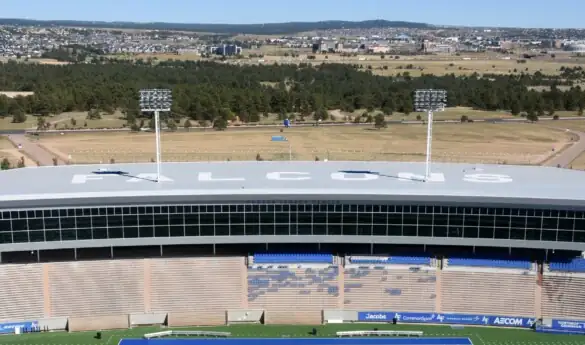 Football stadium with "FALCONS" and "AIR FORCE" on the field
