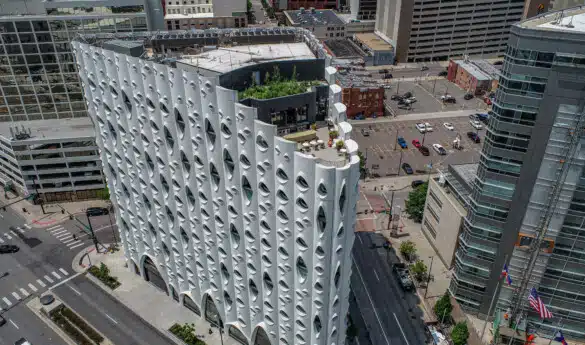 Aerial view of a white building with unique architecture